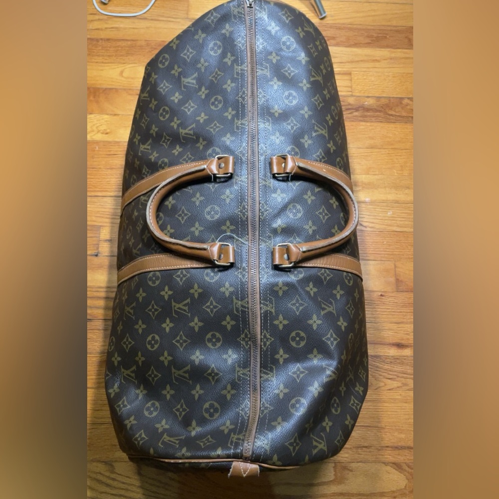 Authentic, vintage Louis Vuitton keep all bag.